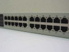 Unicom Dyna-Switch/24 FEP-31024T-1 — front port panel close-up showing all 24 numbered RJ-45 10/100Base-TX ports