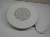 TOA PC-671RV ceiling speaker – front grille close-up, circular white perforated cover with short wired lead