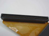 Close-up of IBM 27F4603 ribbon cable IDC connector showing pin rows clearly