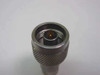 OSM RF load termination 3001 6100-00 — end-on view of N-Male connector face showing center pin and outer thread
