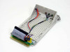 Compaq 146763-001 SCSI drive caddy — side angled view showing caddy frame, PCB board, and internal wiring harness