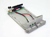 Compaq 146763-001 hot plug SCSI hard drive caddy — top angled view showing PCB, ribbon cable, and LED indicator assembly