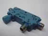Triangle Microwave CO-361 Directional Coupler — angled top-rear view showing OUT port label and IN port SMA connectors
