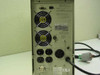 Minuteman PML2000 UPS rear panel close-up showing DB9 port, dual fans, NEMA 5-15R receptacles, NEMA 5-30R twist-lock VAC OUT connector, input connector, and rating label