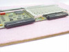 HP D1470-60001 Processor Board – angled end view showing dual high-density card-edge connectors and component side of PCB