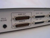 Raritan MCPS16 rear panel close-up showing Bank OUT and Bank IN DB25 cascade connectors and PS/2 mouse port