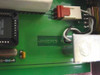 ESI HPMIO PCB close-up showing HPMIO PCB silkscreen marking, crystal, and red connector block