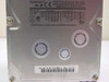 Quantum Atlas III 18.2GB SCSI hard drive — top label view showing Atlas III 3.2 Series branding, 18.2 GB capacity, power requirements, and part number TD18W011 Rev 01-B