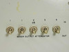 ASM-16A mixer output attenuator detail — five toggle switches labeled 1, 1, 2 dB, 3, 5 with IN and OUT ports