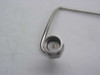 Close-up of SMA male connector end of stainless steel preformed coaxial cable 202543-001 showing center pin