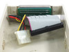 Interior of Cybernet VP-15 IDE caddy showing 40-pin ribbon cable connected to ZEON 1004-A0 PCB and Molex 4-pin power cable
