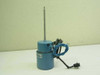 Filter Chem M1294K16 electric motor front-left view showing blue cylindrical body, vertical threaded shaft, and attached multi-pin connector with lead wires