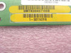 Close-up of yellow labels on GNP Computers control board showing SMTK98467106B and 1-501147FR part number barcodes