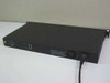 Accton EH2005-TX SwitchHub-8se – rear panel showing two RJ-45 ports, cooling fan, and IEC power inlet with attached power cord