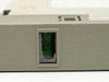 IBM 5822-018 front panel connector port close-up showing broken plastic on face cover latch housing