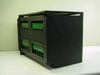 Isoetec EZ-1/96 12100 PBX phone system rear view showing two rows of card connectors and green PCB edge connections on black steel chassis