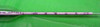 Close-up of hydrometer bulb end and lower stem showing scale markings around 1.750 to 1.800 range with partial manufacturer marking