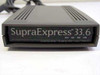Supra SupraExpress 33.6 modem — front panel close-up showing model name, OH/SD/RD/ON indicators, and spec text: 33,600 bps DATA, 14,400 bps FAX, V.42bis, MNP 2-5