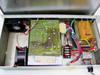 DEC H7421A power supply interior view showing PCB, transformer, cooling fan, and wiring harness