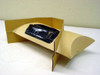 Lexmark 69G8256 toner cartridge inner packaging – cardboard sleeve opened showing sealed black toner bag inside