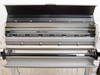 HP DesignJet 2500CP internal print mechanism — platen, guide rails, and media roller visible with top cover open
