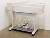 HP DesignJet 2500CP C4704A wide format plotter, rear three-quarter view on rolling stand