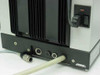 Reichert-Jung 2050 rear panel — circular DIN connectors, power switch, heatsink fins, and cable connections
