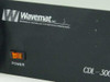 Wavemat CDL-300 front panel close-up showing Wavemat Inc logo and CDL-300 model designation with orange power switch