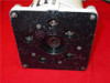 Photo-Sonics 4B sync motor bottom plate showing mounting flange with central drive shaft hub and mounting bolt pattern