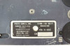 Photo-Sonics 16mm-1VN Film Magazine 74-4003 — close-up of rating plate showing 16MM-1VN 100FT Magazine, P/N 74-4003, MFG.02024, serial number