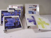 Full lot of nine NEC NEAX 2400 ICS IMX IPX PBX manual binders arranged on a table, showing all volumes