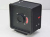 70mm copy camera film magazine – opposite face showing lens/film aperture opening with red indicator flag and chrome hardware