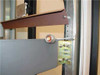 Varian 1015230 cabinet interior detail showing RF N-type or coaxial connector panel with illuminated connector and terminal block