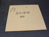 Cardboard box label showing 1/4TK x 12x12 PFP with handwritten size notation — glass plate lot packaging