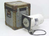 Giannini Scientific 205-071-7 three-phase motor assembly shown next to its rugged metal transit case with latches and carry handles