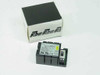 Red Lion Controls MLPS power supply module shown with original Red Lion branded box — front angle view