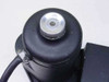 Photo-Sonic Motorized Film Take-Up Unit – close-up of top of motor canister showing silver threaded cap and hose clamp securing cable