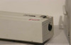 Lexel Excel-3000 laser head end panel showing output aperture, danger label, and BNC-style beam port