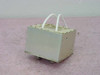 EF Johnson 23-2569-003 duplex filter — metal-cased shielded enclosure with two white wire leads, side view