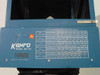 Close-up of Kenro MP-812 row/counter and column settings chart for MP-4 lenses on blue housing