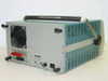 Gould Biomation K100D rear 3/4 view showing large cooling fan, teal side panels, carry handle, and rear-panel connector section
