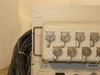 Maxsys VSX Interface Test Adapter — left side showing P/N 465-1040 label and partial view of front panel rotary connectors and HIGH VOLTAGE label