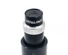 Close-up of Unitron branded eyepiece with silver knurled focus ring on optical tube