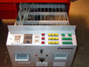 Karl Suss MA56 control console — red/green/yellow pushbuttons, indicator lights, and card cage visible with drawer open