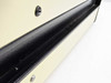 Karl Suss controller housing edge detail — black painted metal rail and cream panel, showing minor surface wear