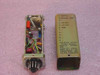 Versitron R306M Isolation Device Output Module — disassembled view showing internal PCB with components and the label panel reading Model No. R306M, Product No. 15892, Versitron Inc, U.S. Pat. 3,385,970