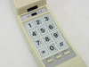 GPX GPT410 close-up of large button keypad with Tone/Pulse switch, Mute, Reset, and Redial buttons