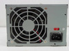 IBM Delta DPS-145PB-73 90W ATX power supply — rear panel showing IEC power inlet, voltage selector switch, and cooling fan