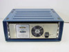 Tau-Tron SRX-1101 BERT Receiver – rear panel showing RS-232 and GPIB connectors, cooling fan, and IEC AC inlet