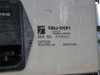 Tau-Tron STX-1101 side/bottom label showing 'tau-tron a unit of General Signal', serial number 8708107, Option field, Westford MA, Made in USA